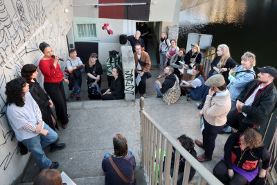People gather in the stairs in front of Kunstbrücke