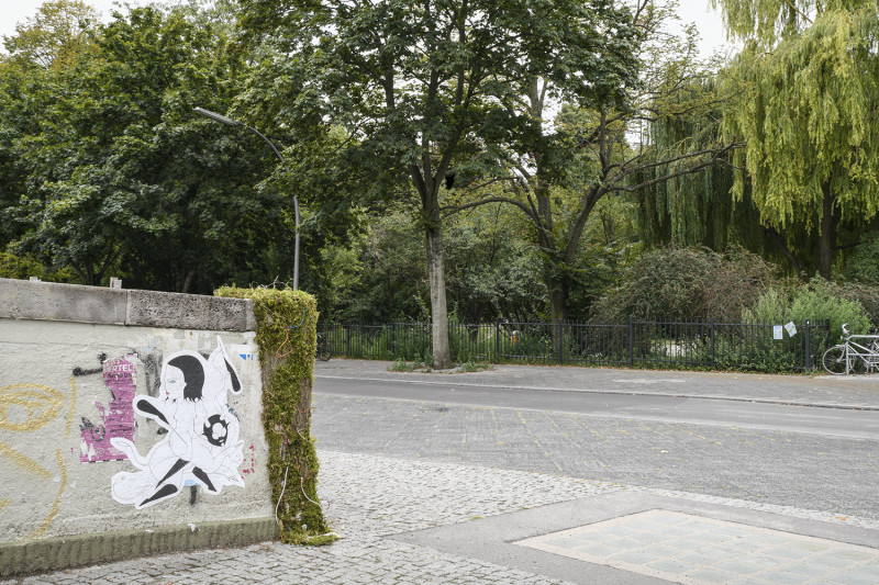 Park view, with poster on the bridge