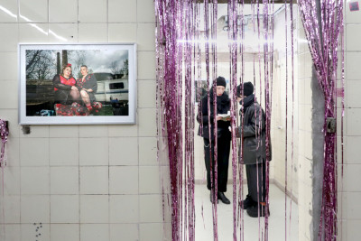 View of the photo exhibition with glitter curtain