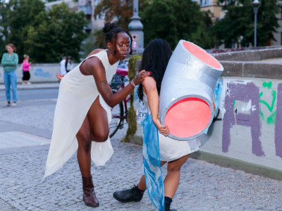 Lifeperformance by AVA / KNVNT / Blue Blood Group: BODIES OF WATER, 2022. The performer dance with a pipe.